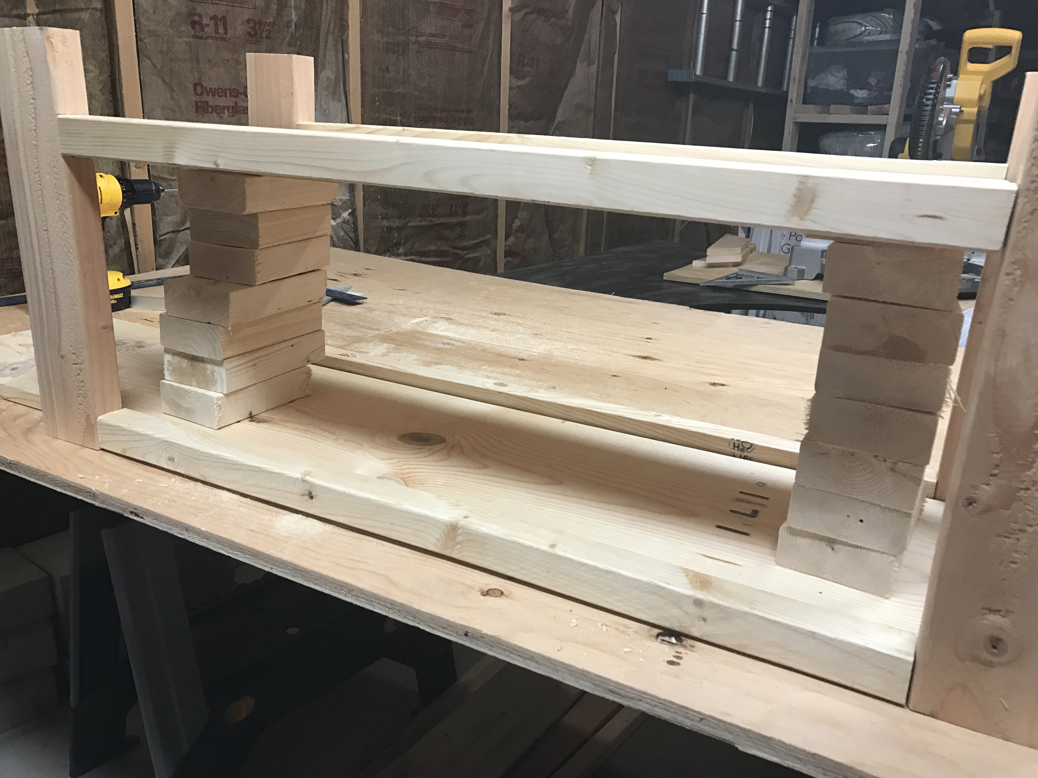 scrap lumber holding shelf in place to facilitate clamping