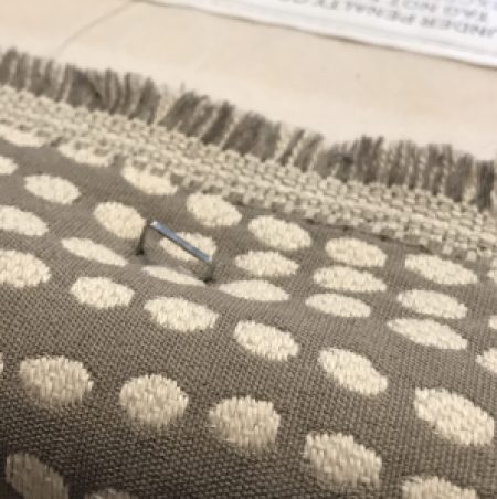 incorrectly executed staple is sticking out of fabric