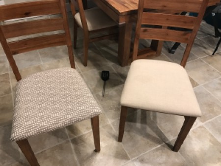 two chairs, one with new fabric and one with old fabric