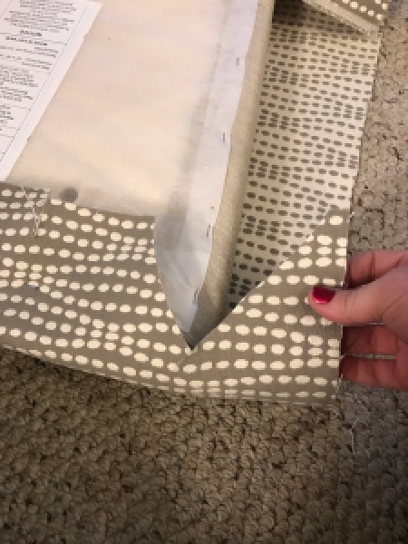 remove extra fabric by cutting some out before you fold to staple