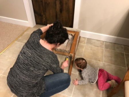 toddler watching chair seat getting attached